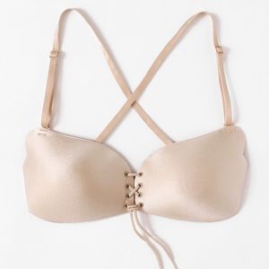 Lace up bra with detachable straps.